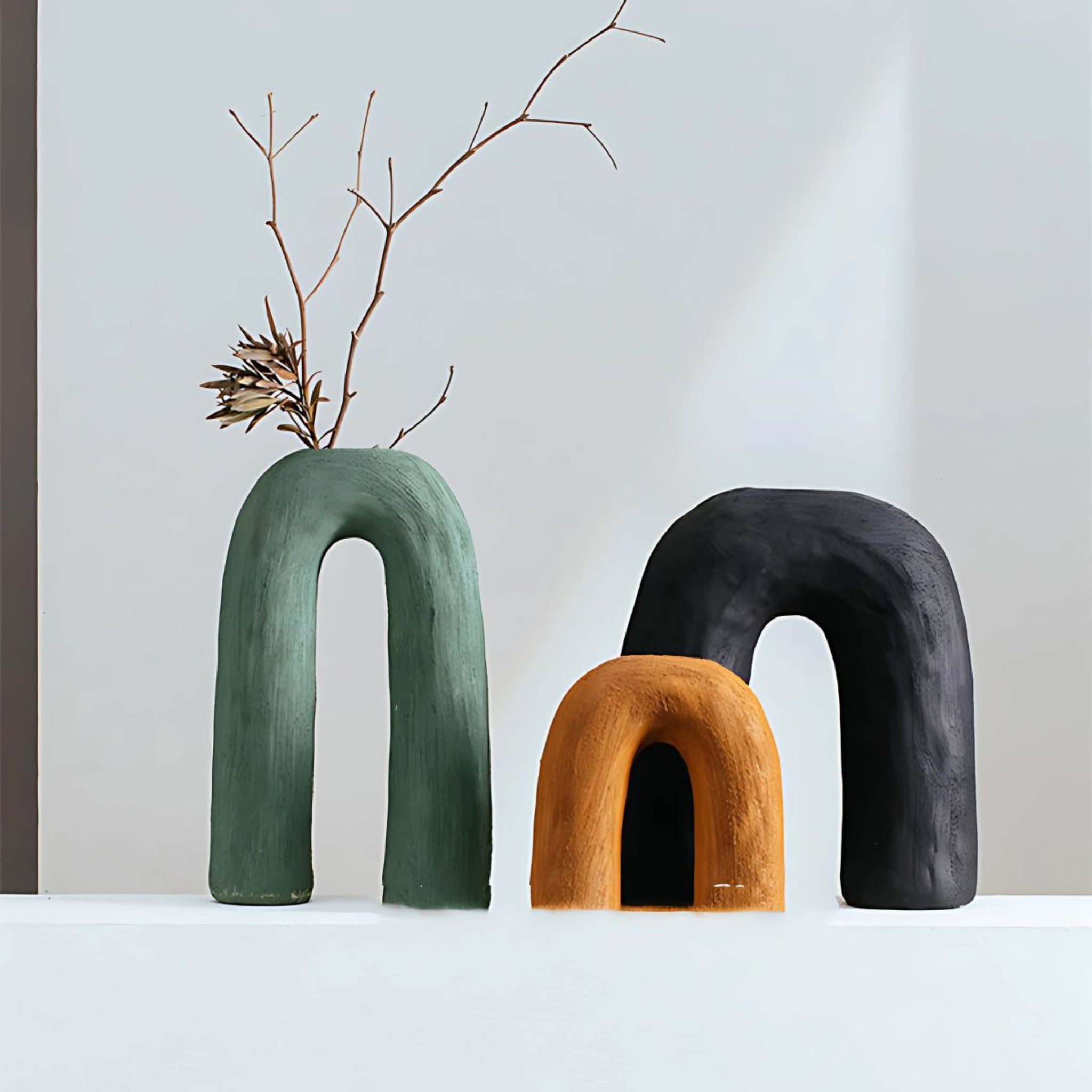 Green, Burnt Orange & Black Ceramic U shaped Arch Vases.