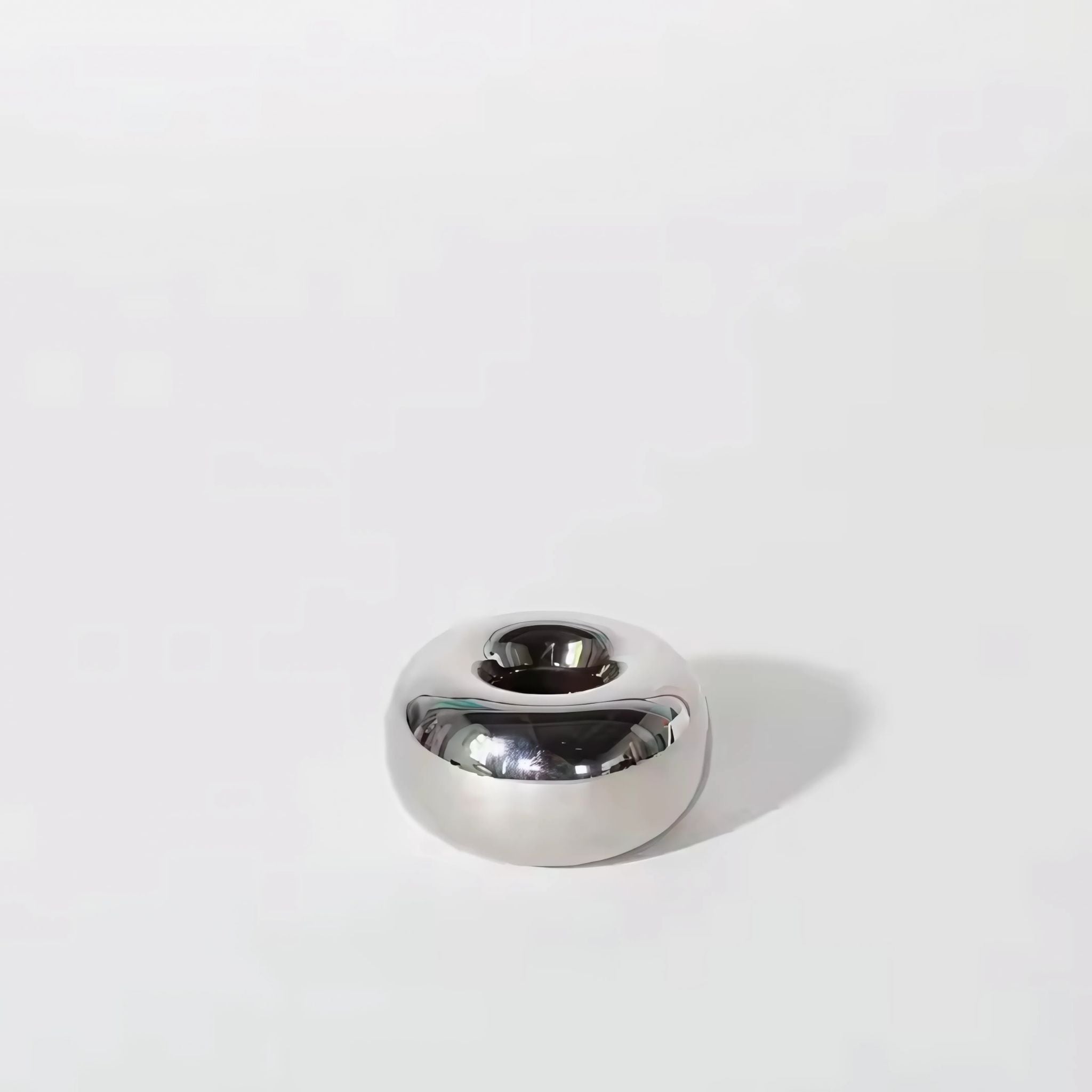 Silver chrome candlestick holder décor.
