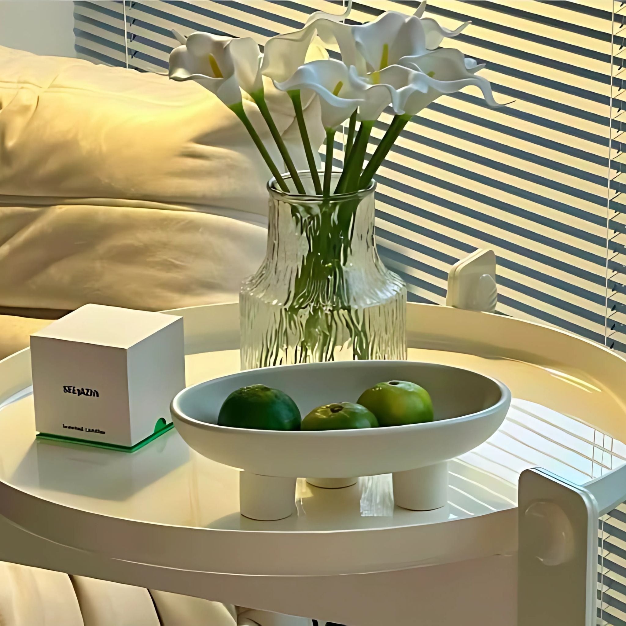 White, elevated, decorative table tray decor in living room.