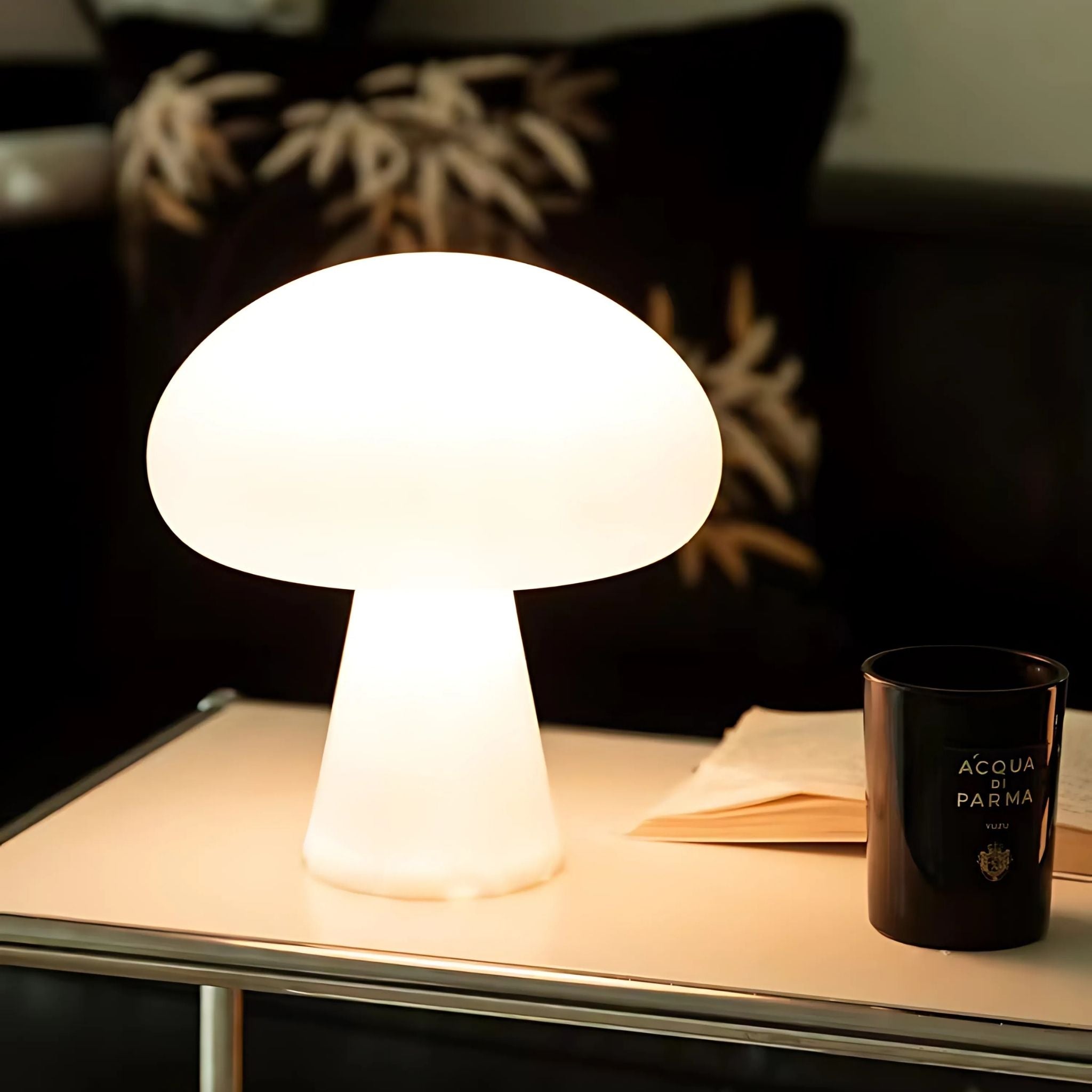White, glowing, cordless mushroom lamp.