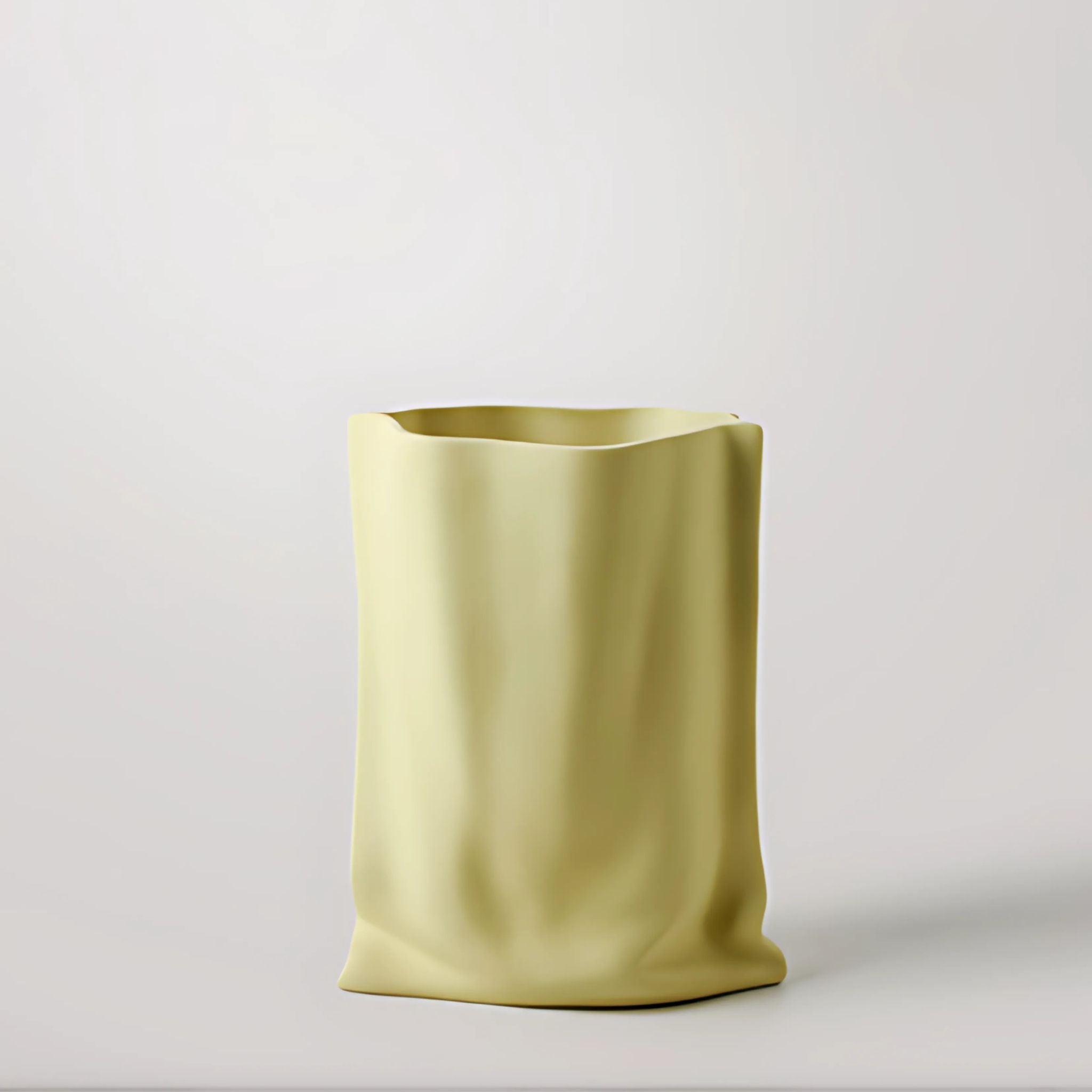 Yellow, ceramic, bag design decorative vase.