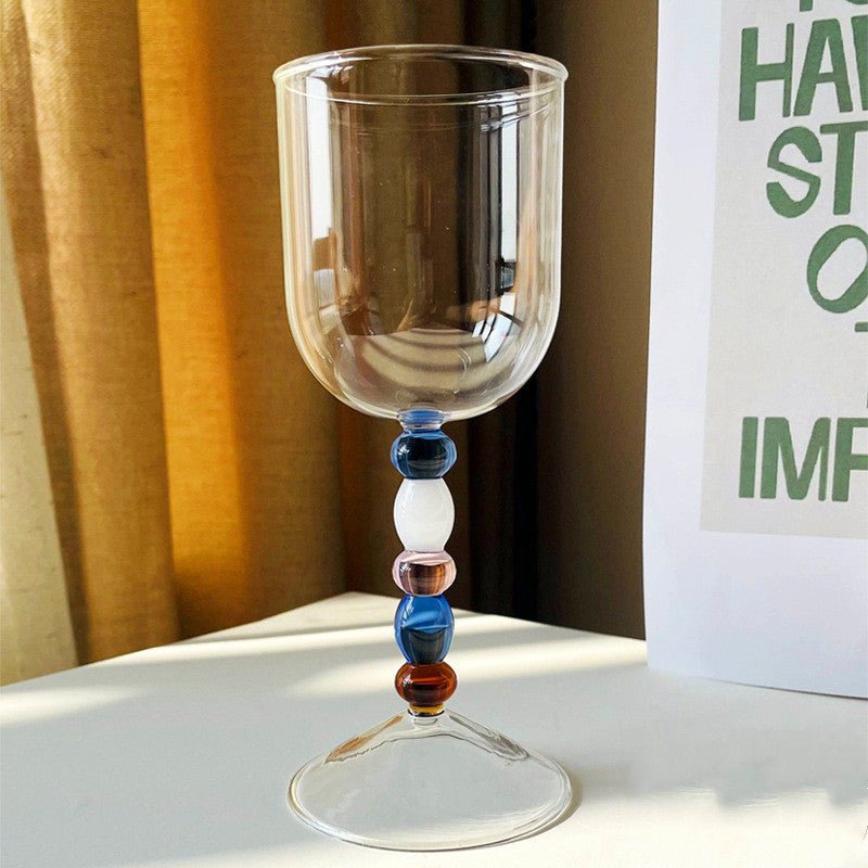 Colourful beads stem wine glass.