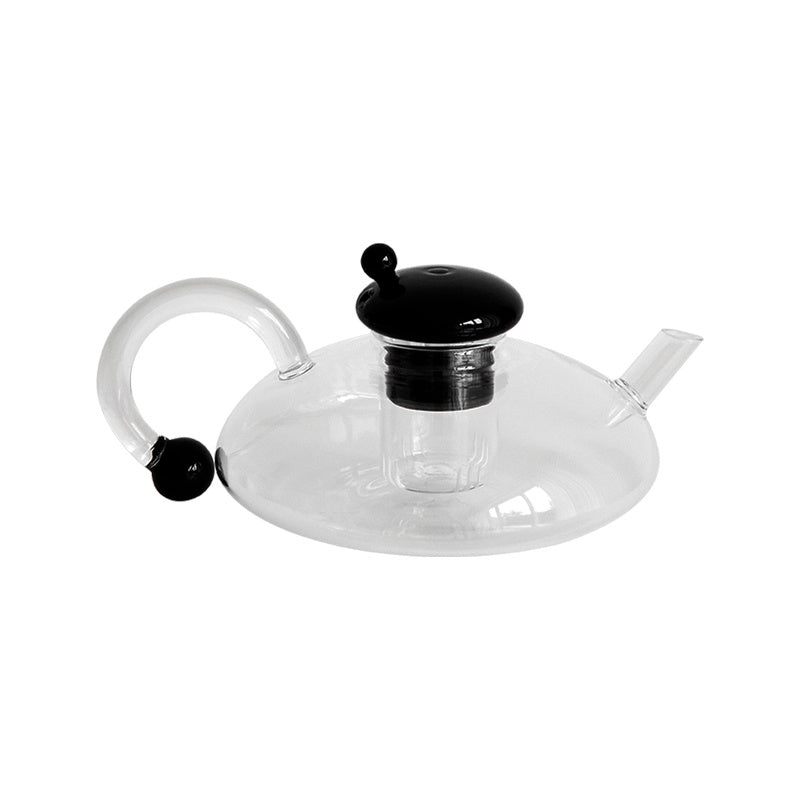 Modern glass teapot with unique design.