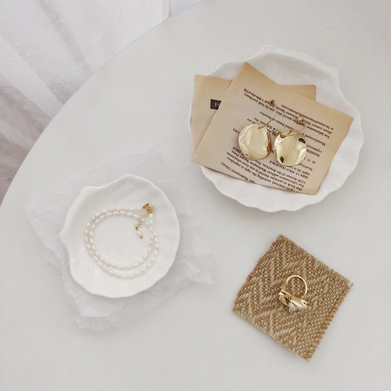 White elegant decorative jewellery trays.