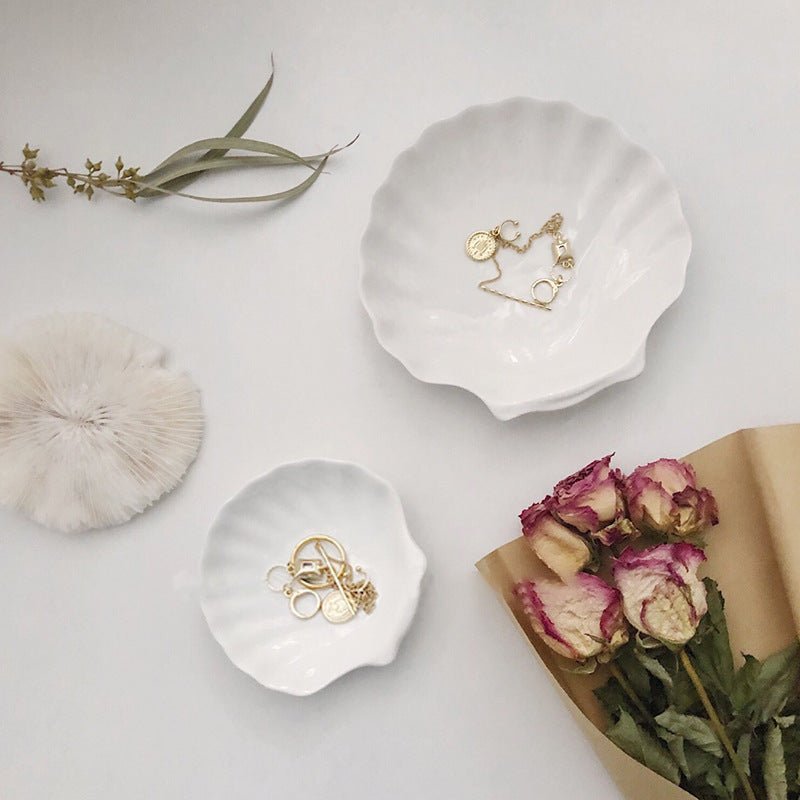 White elegant ceramic jewellery table trays.