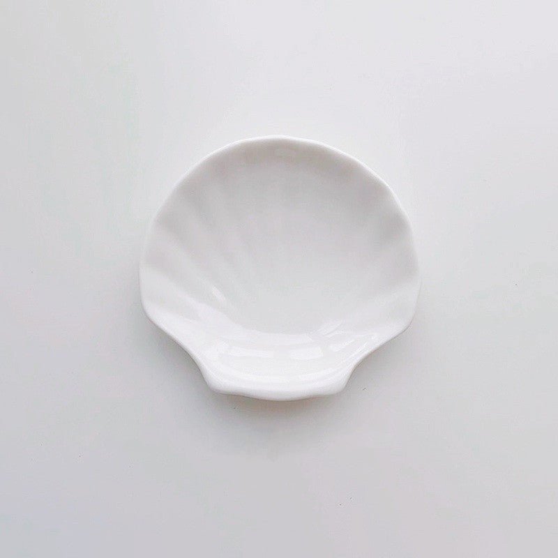 White ceramic shell tray.