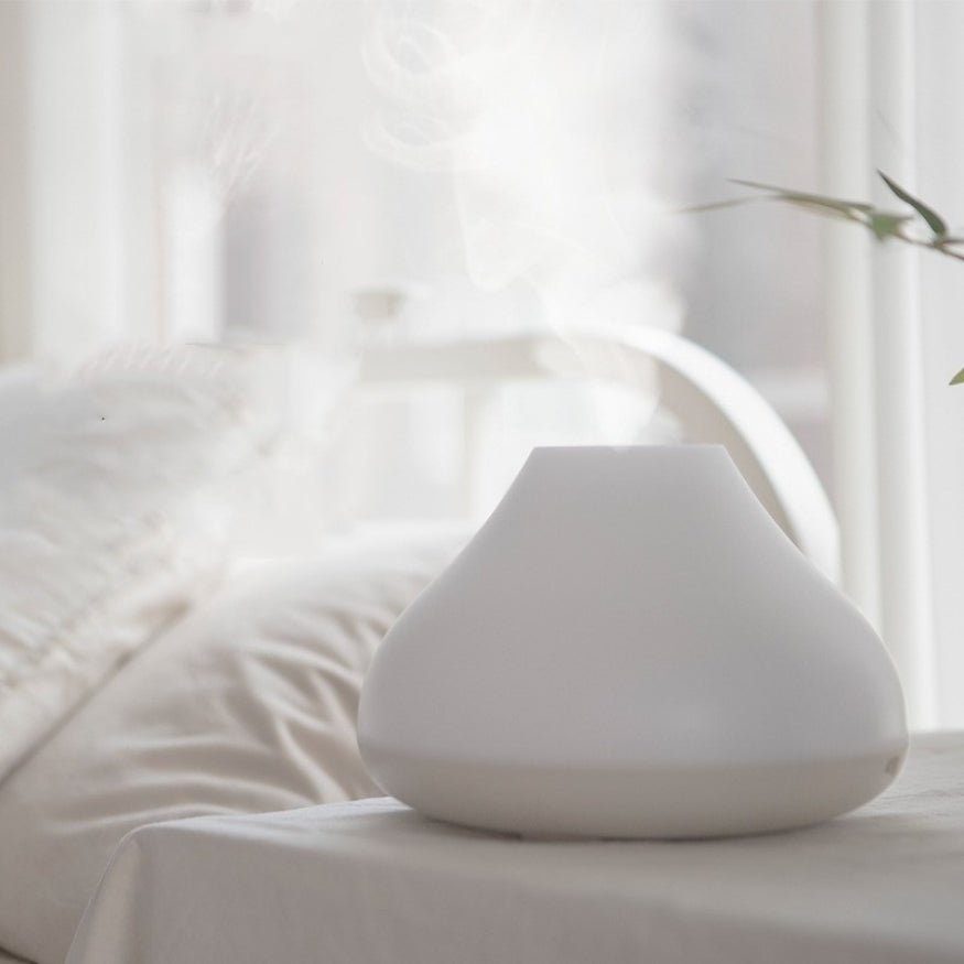 bedside table white aroma therapy air humidifier.