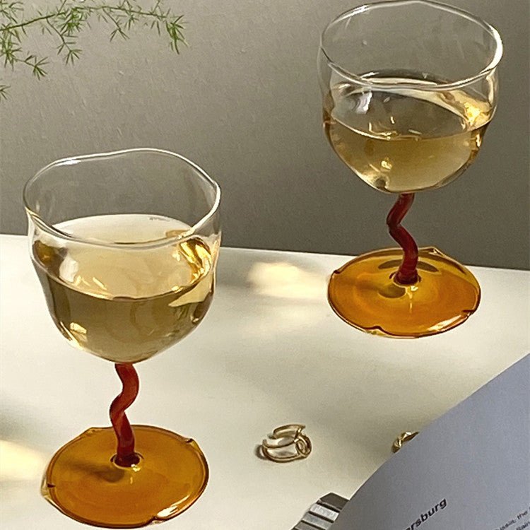 Irregular glass goblet wine glasses.