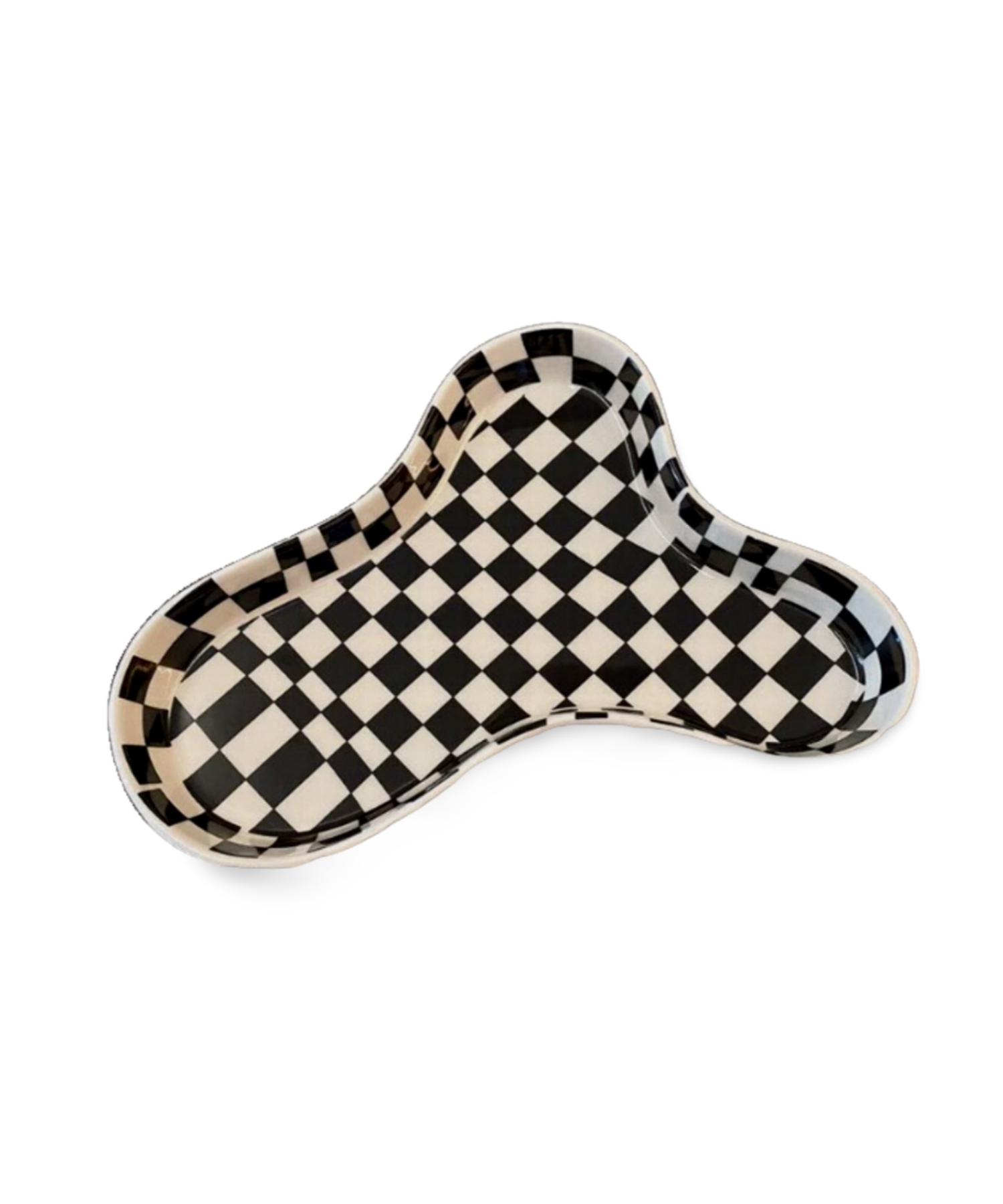 A asymmetrical, black and white checkerboard patterned tray