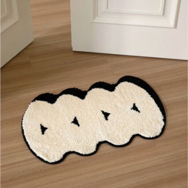 Black and white wavy cloud decorative floor rug.
