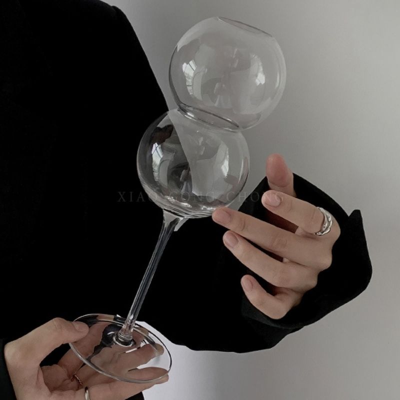 Double layered ball glass goblet.