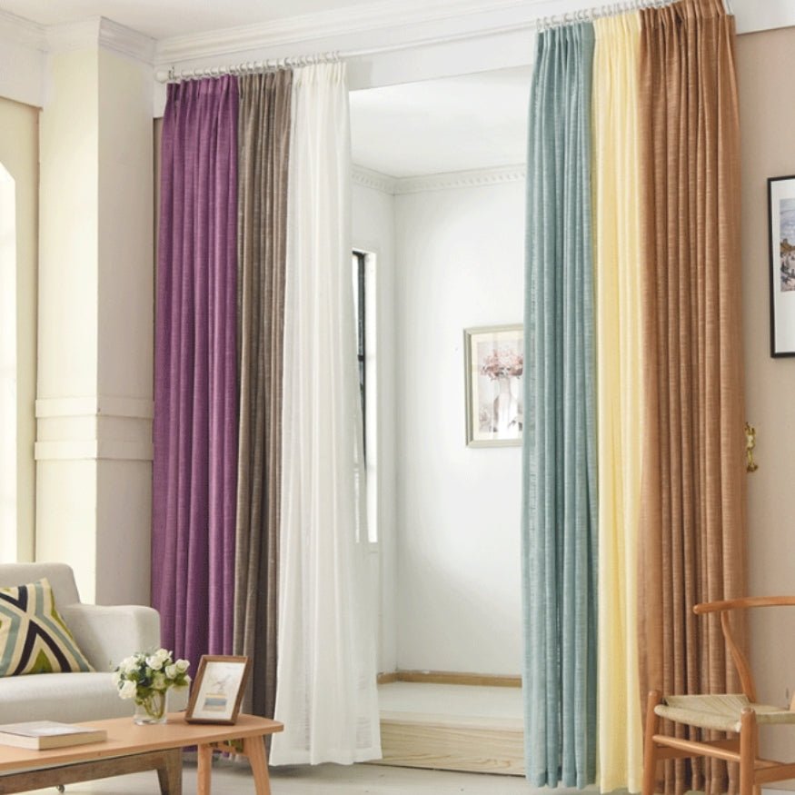 Colourful, long, crisp linen curtains.