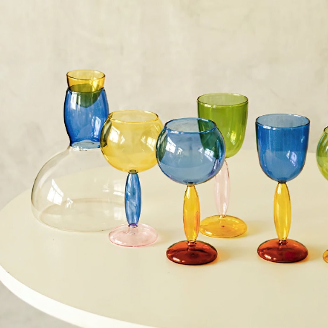 Colourful glassware decorative kitchen goblet and drinking glasses.