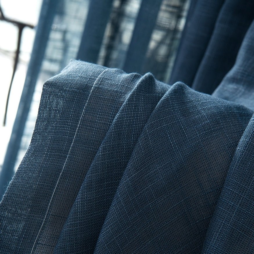 Dark blue, crisp, linen curtains.