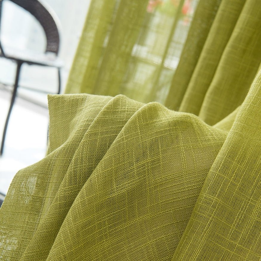 Green, crisp, linen curtains.