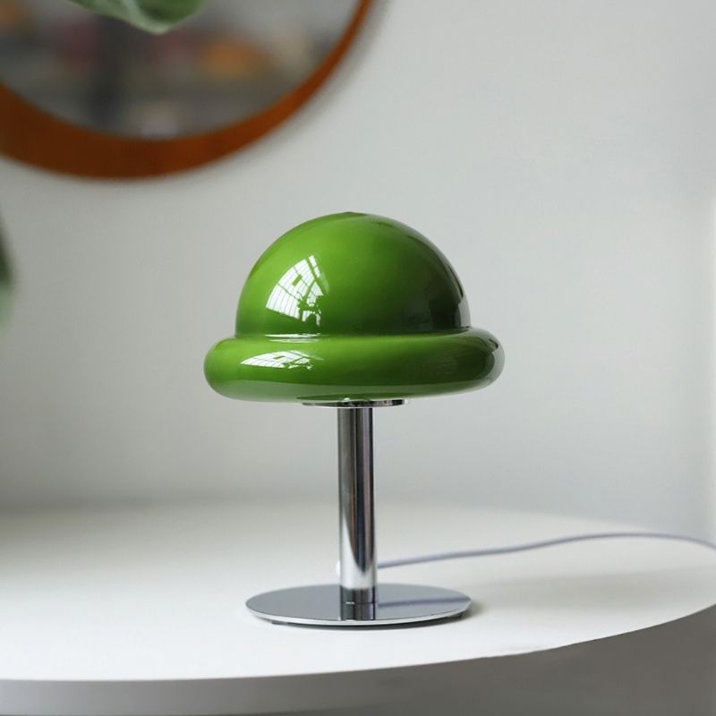 Green glass macaron decorative table lamp.