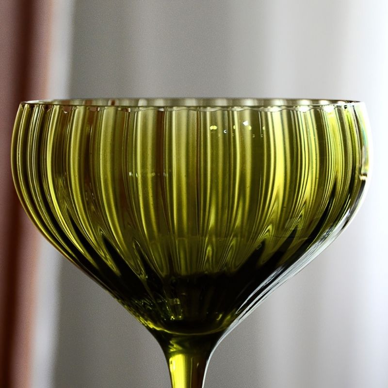 Emerald green ripple glass goblet.