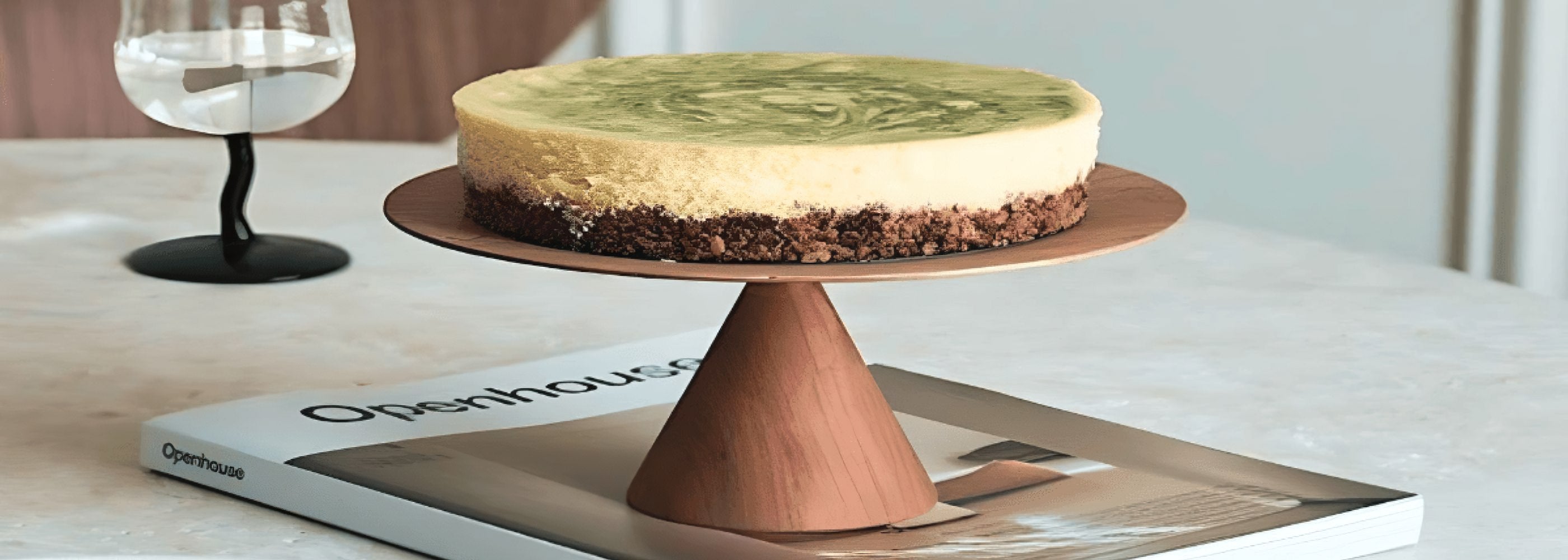 Elevated round wood tray with cake image banner