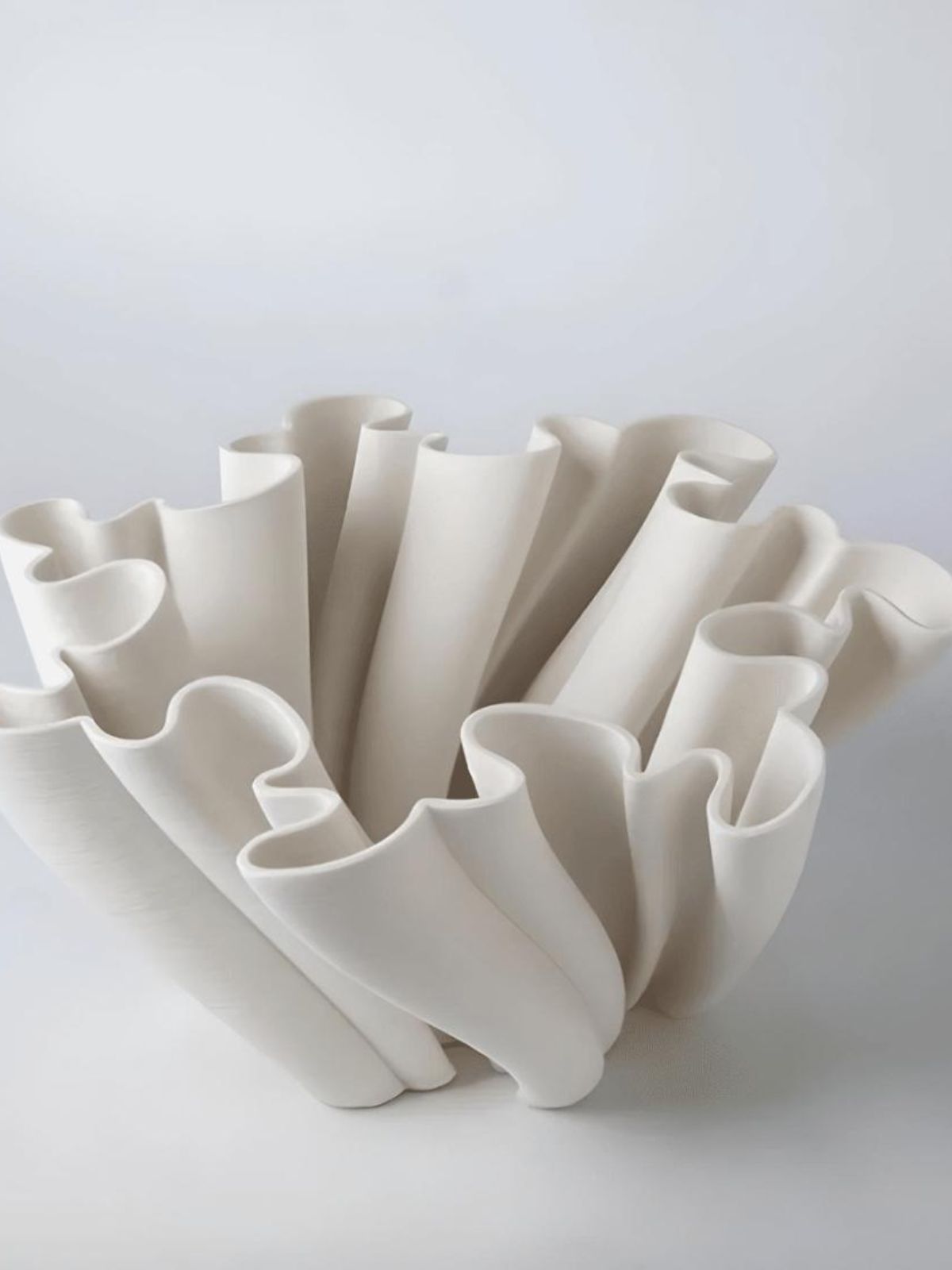 Asymmetrical ceramic white ornament bowl