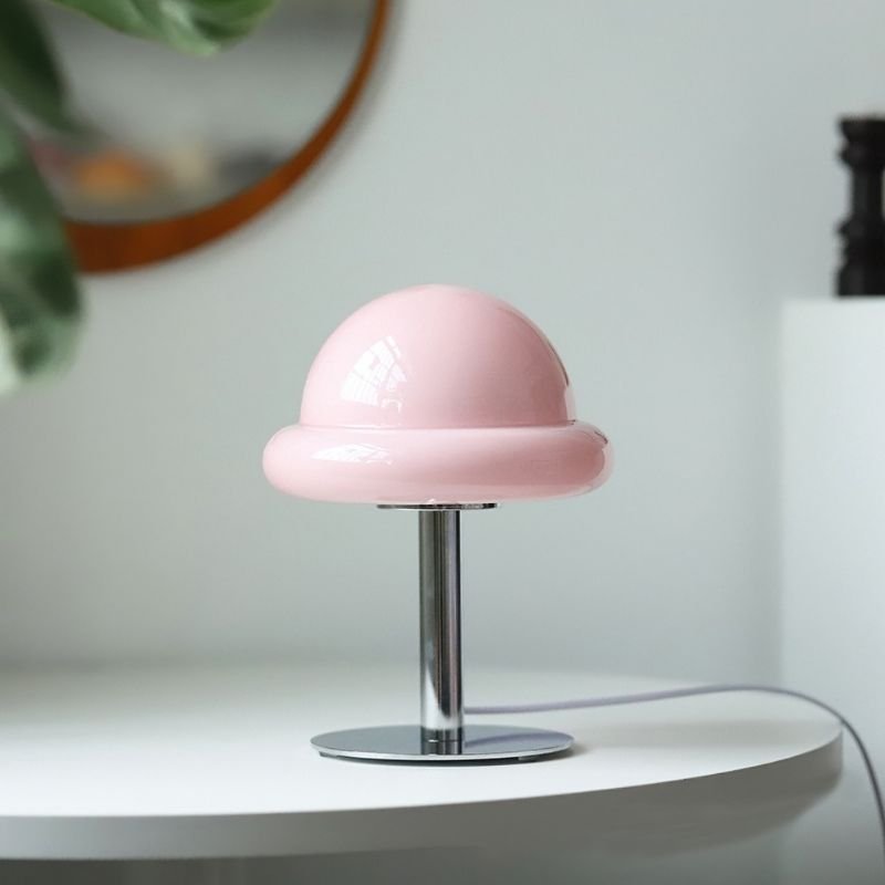 Pastel pink glass metallic decorative table lamp.