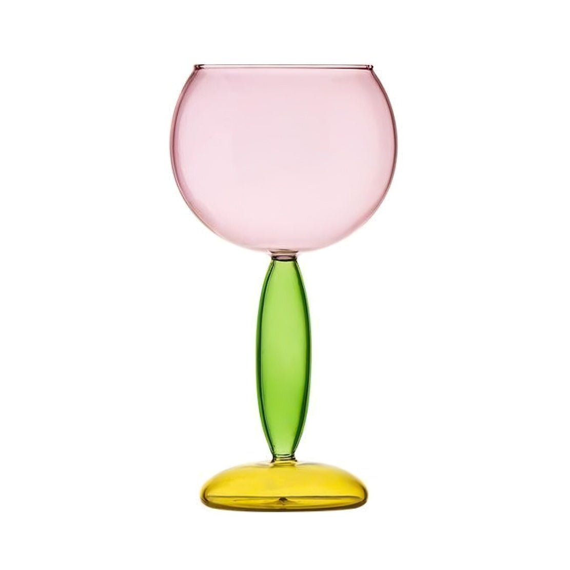 Pink glass goblet with green stem and yellow bottom.