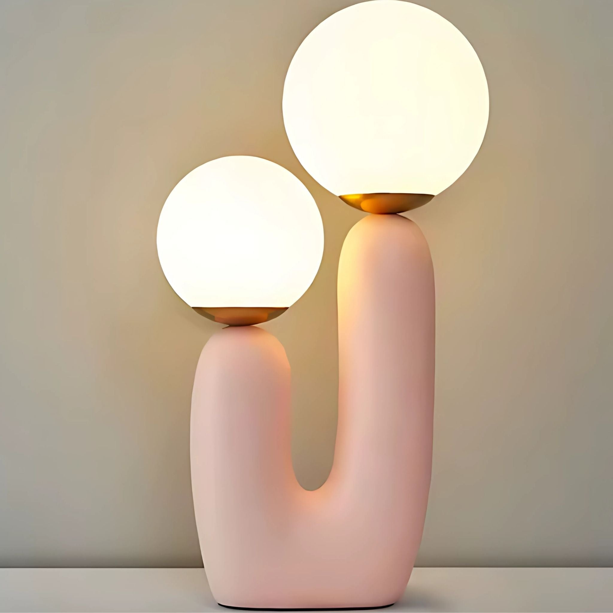 Pink table 'Cactus Lamp' with two light bulbs.
