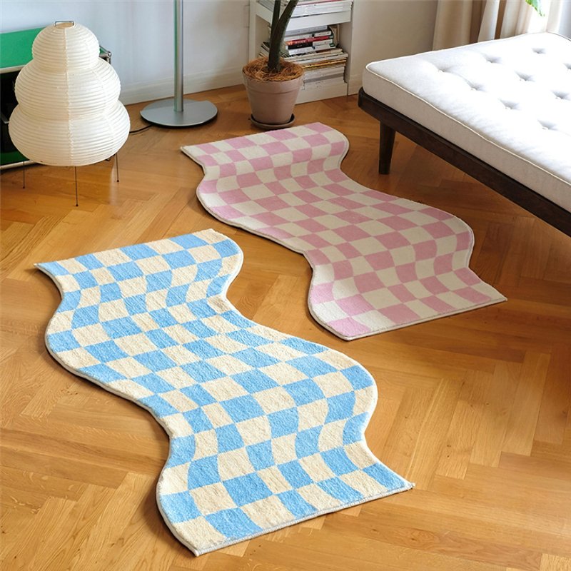 Cute bedroom wavy checkerboard floor rugs in baby pink and blue.