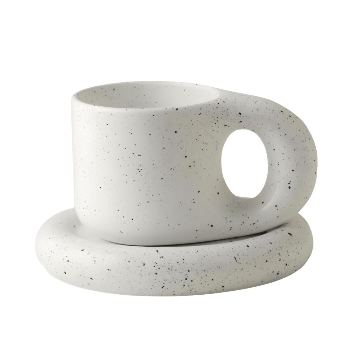 White chunky ceramic mug and saucer