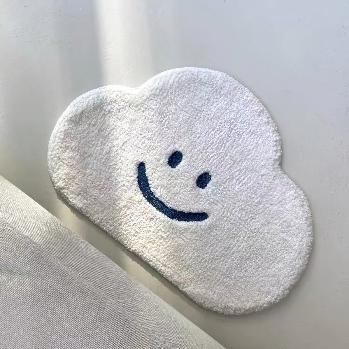 White, cloud smiley face floor mat