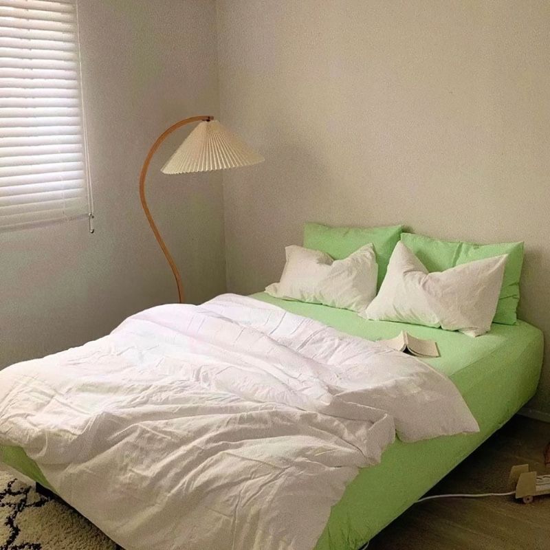 White and green bed sheets bedding set.