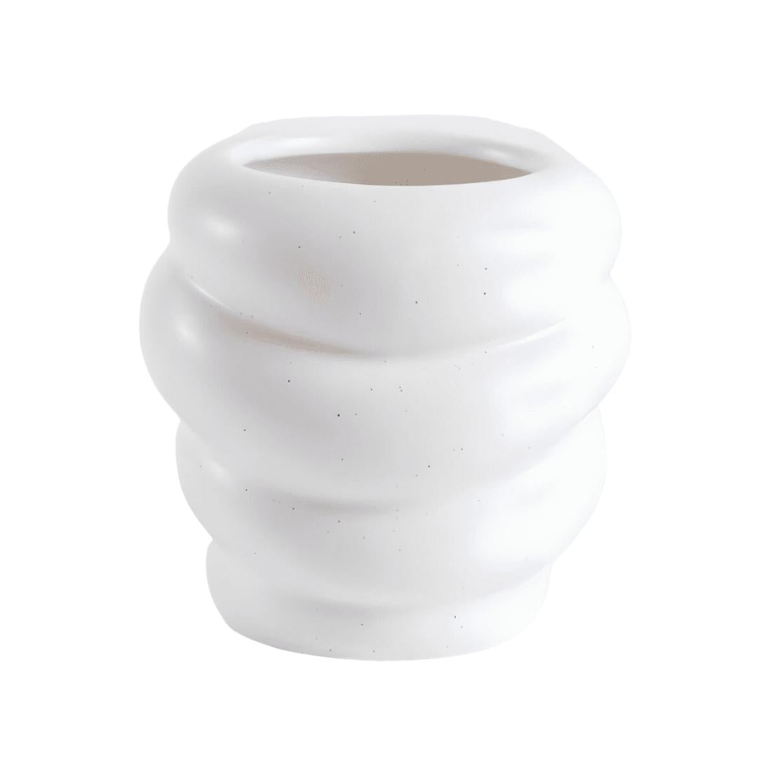 Low, white ceramic honeycomb vase