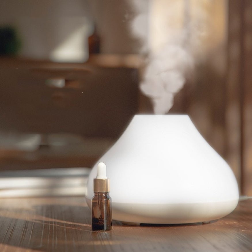aroma therapy essential oil with white air purifier diffuser.