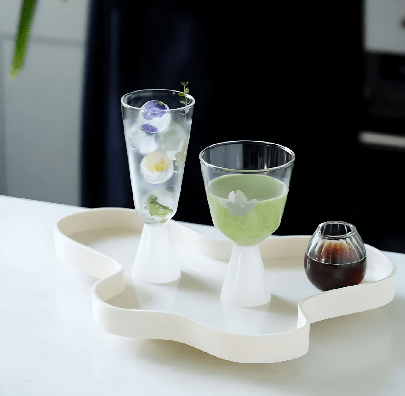 white modern tableware acrylic serving tray with cute glassware.