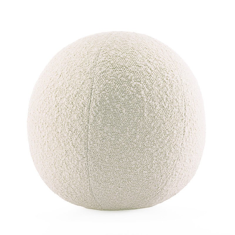 White, decorative round ball cushion.