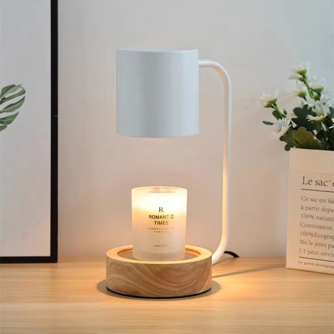 Modern white wooden candle melting table lamp.