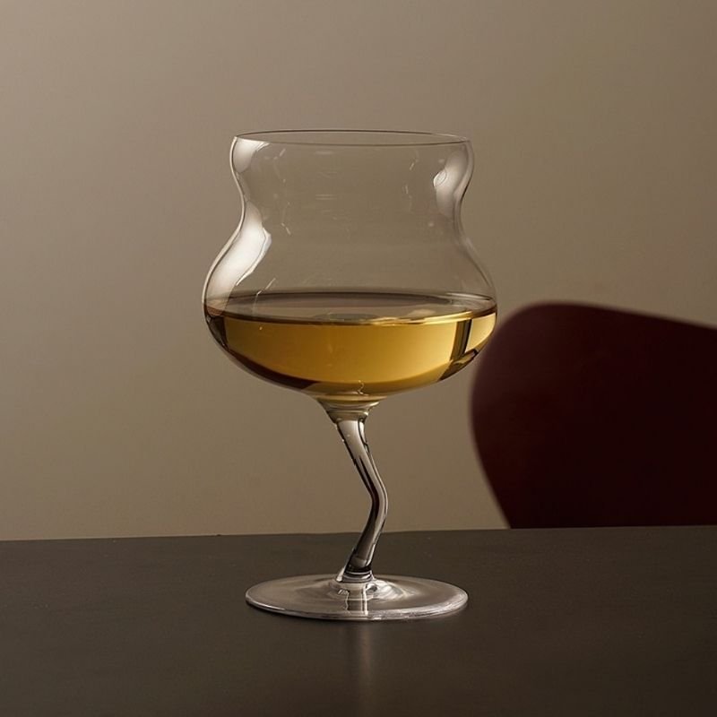 Wiggle stem irregular wine glass.