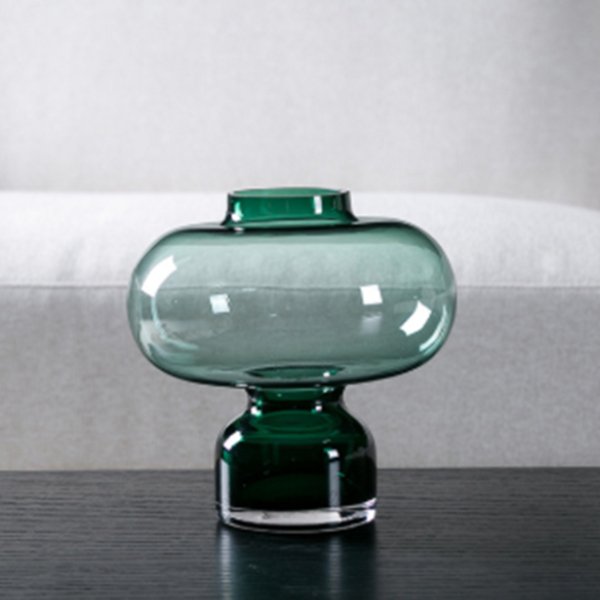 Modern, green glass bubble vase.