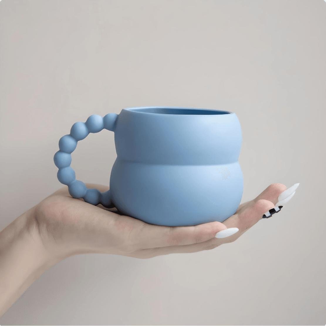 Baby blue ceramic bubble pearl handle mug
