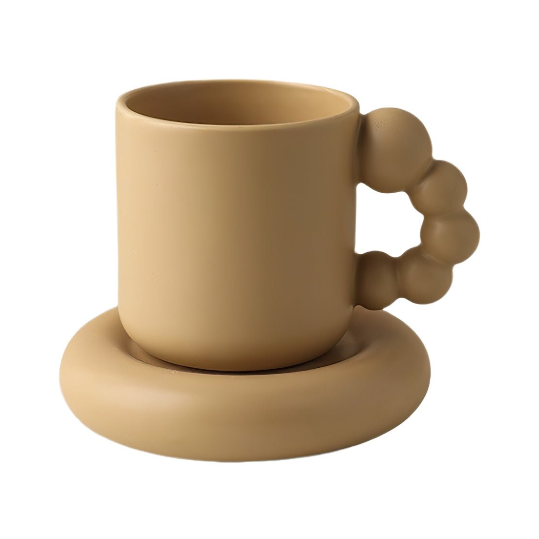 Beige ceramic pearl handle mug with matching saucer