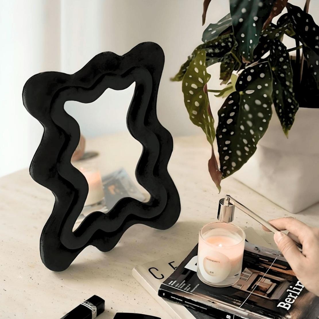 Black, fabric wiggle frame decorative mirror