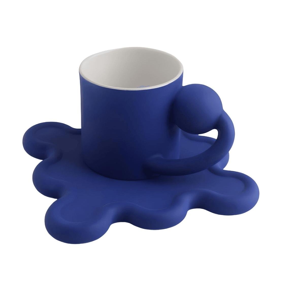 Blue ball handle mug with wavy wiggle saucer