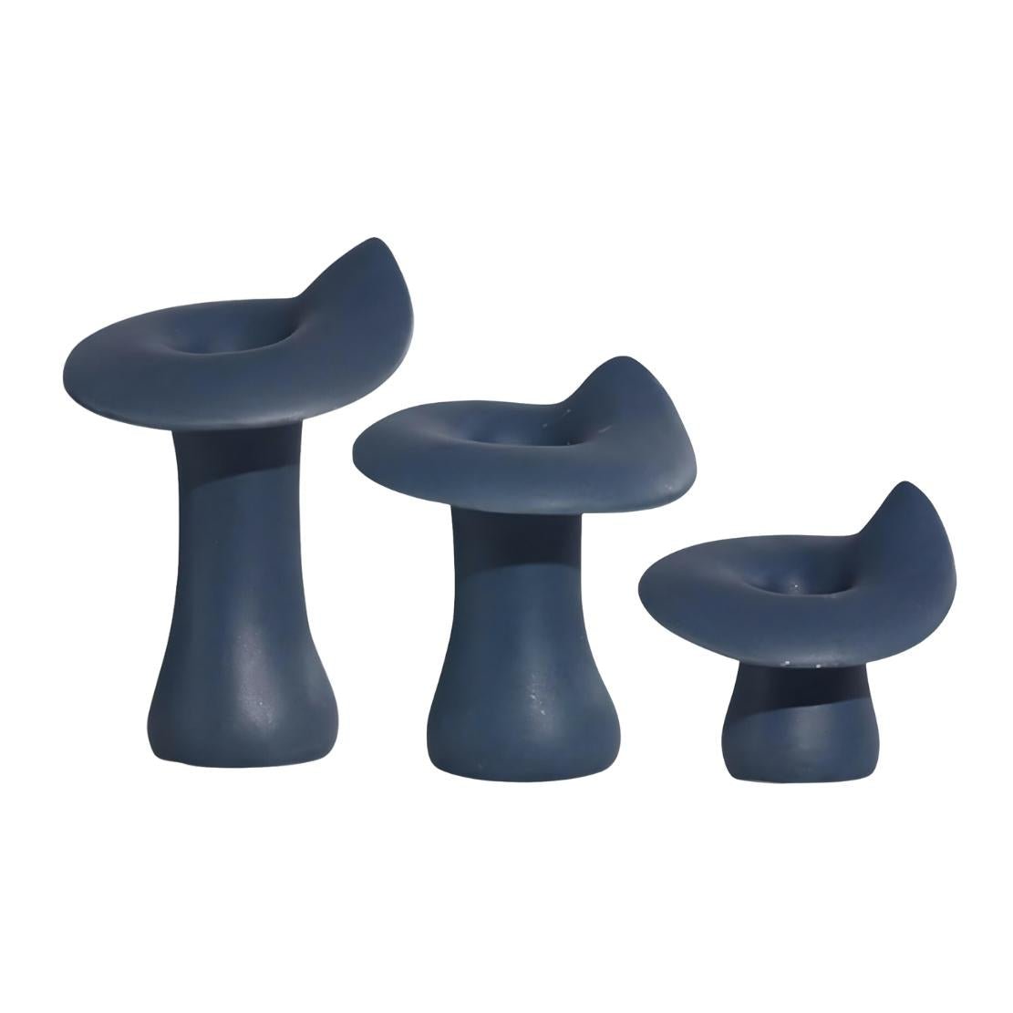 Blue, ceramic mushroom design candlestick holders in three sizes