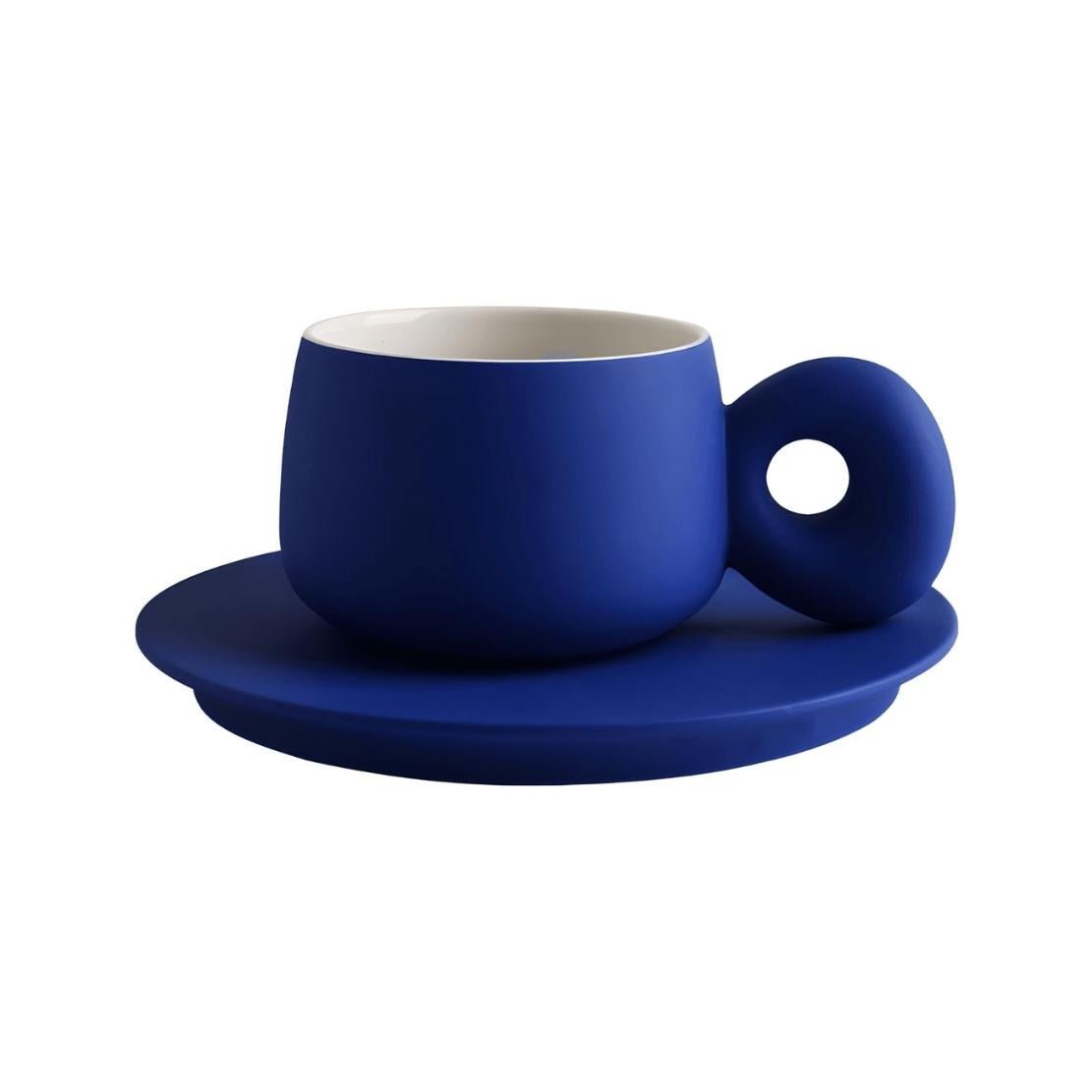 Groovy blue ceramic mug with saucer