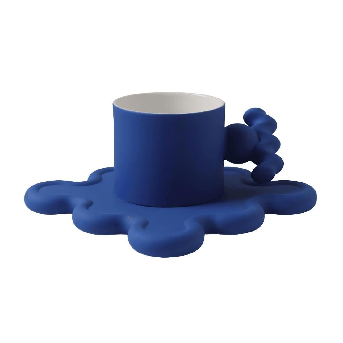Blue geometrical handle ceramic mug & wavy saucer