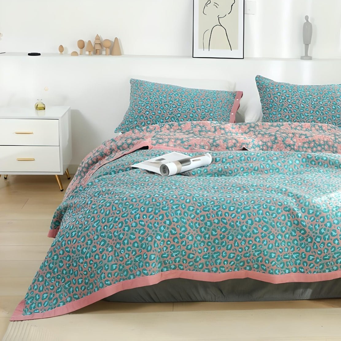 Bedroom with blue pink small cheetah animal print bedding set