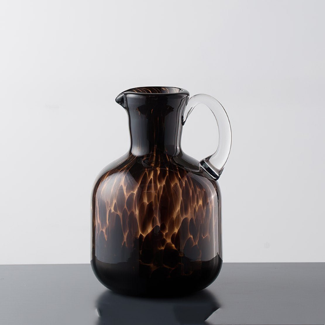 Brown glass tortoiseshell patterned water can or vase