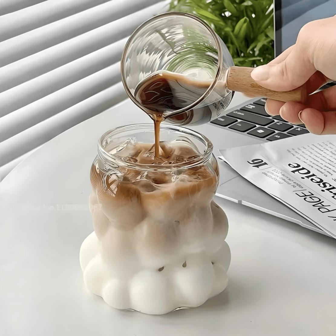 Bubble drinking glass with ice cafe latte