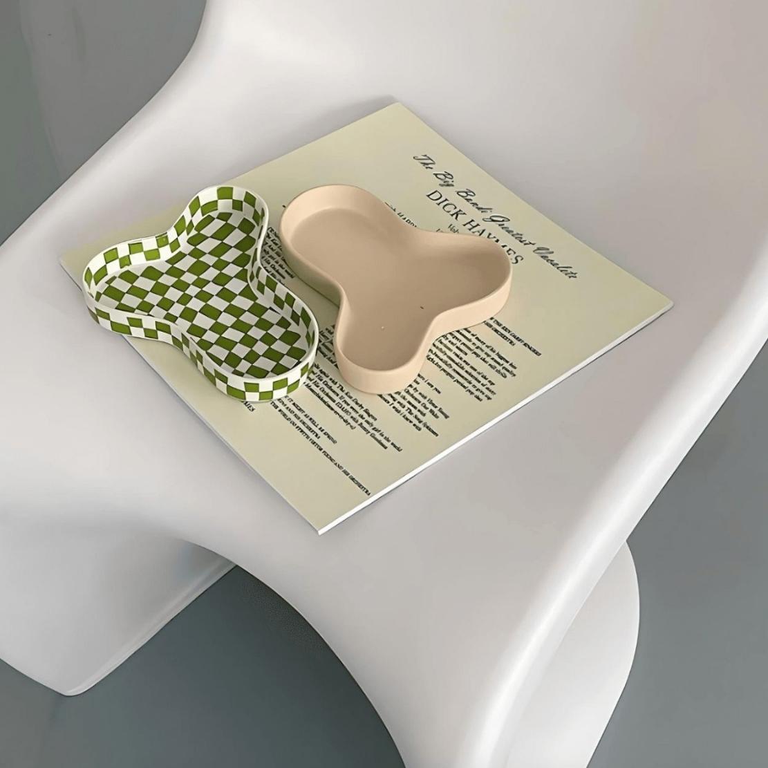 Asymmetrical pond shaped ceramic trays on chair / white green checkerboard / Beige