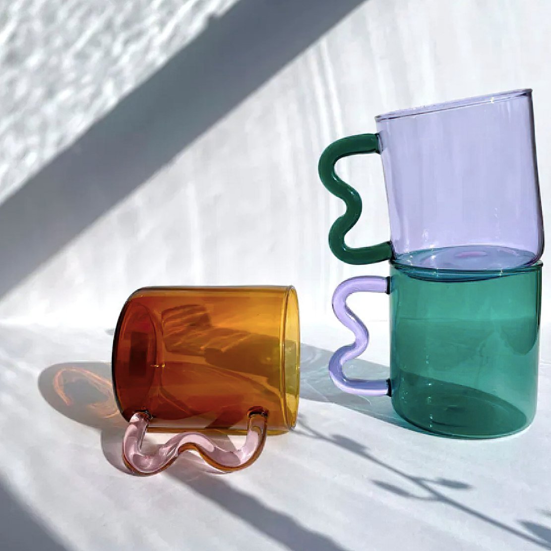Colourful glass squiggle handle mugs