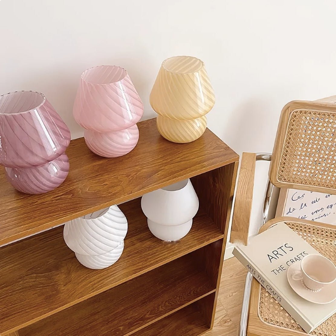 Shelf with cute glass mushroom lamps